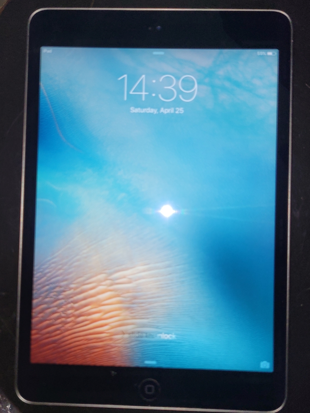 Apple iPad Mini Tablet in Black with Blue/Orange Display